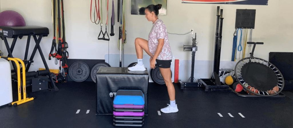 female athlete step up exercise