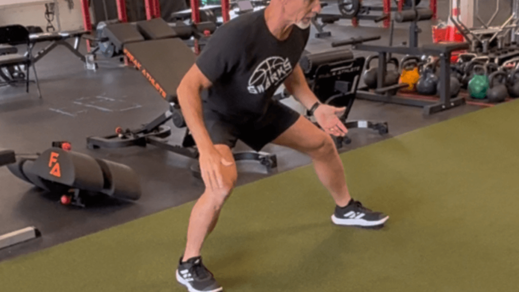 coach demonstrating how to stay in the tunnel