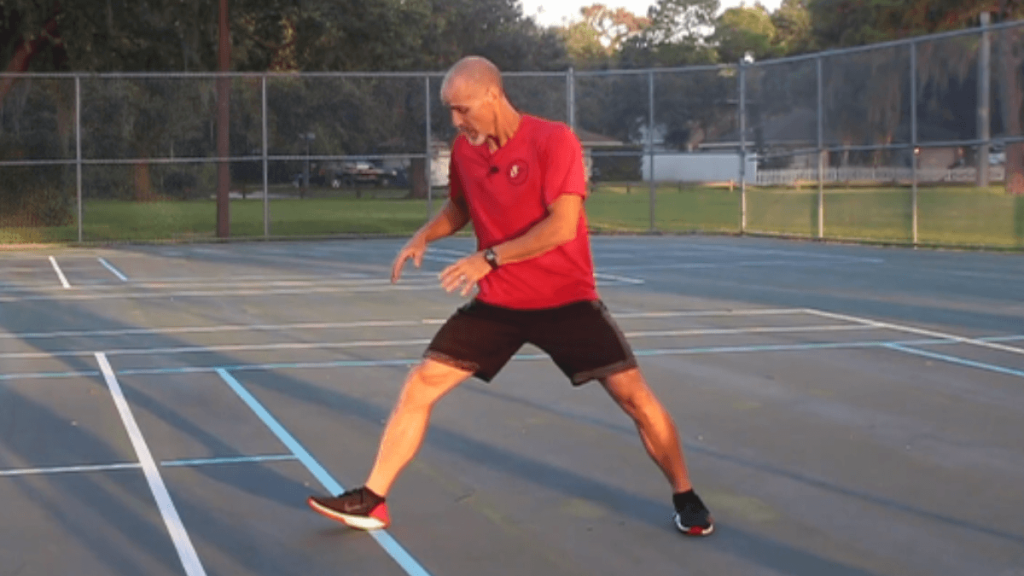 Coach describing the the lateral shuffle mechanics